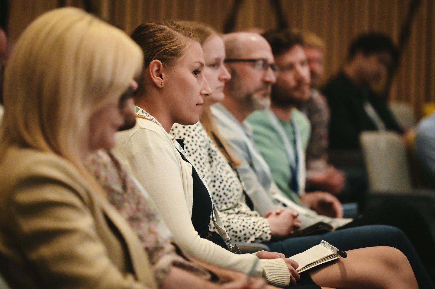People listening at NICD event